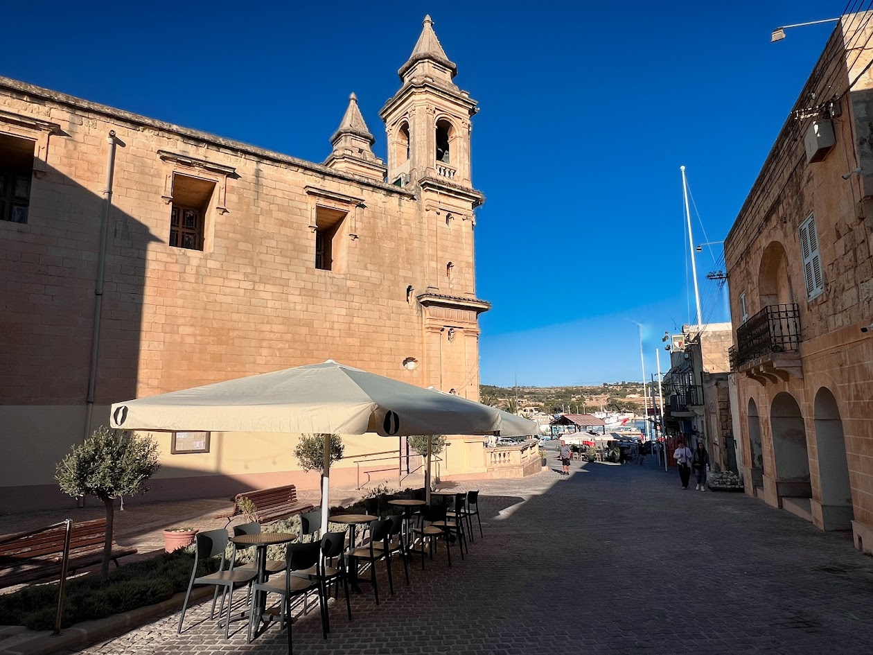 Sweet Steph outdoor tables beside the Marsaxlokk parish church